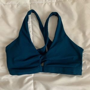 Teal Fabletics sports bra